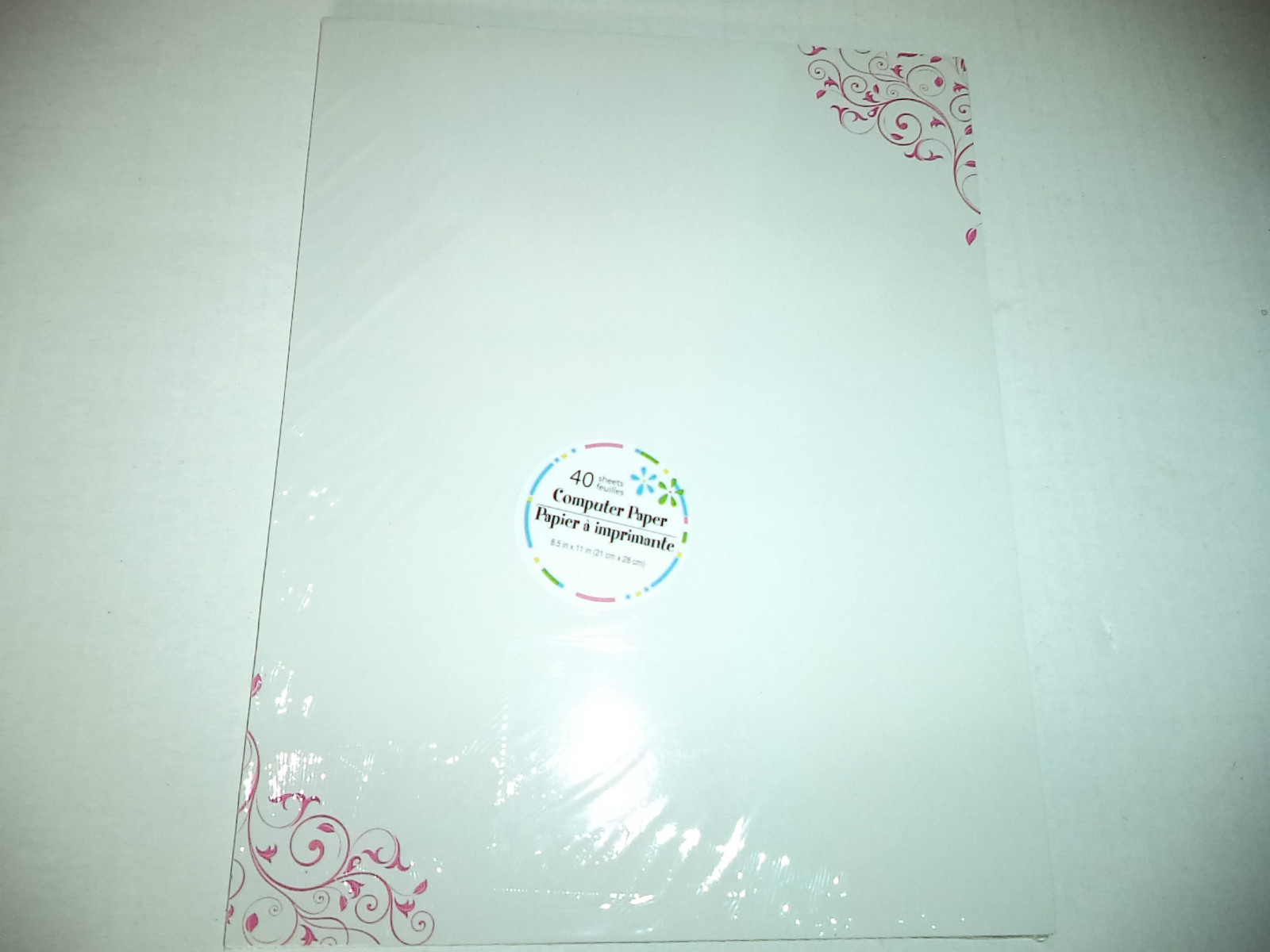 Forty Sheets Of White Computer Paper With Pink Swirls On Two Corner Edges